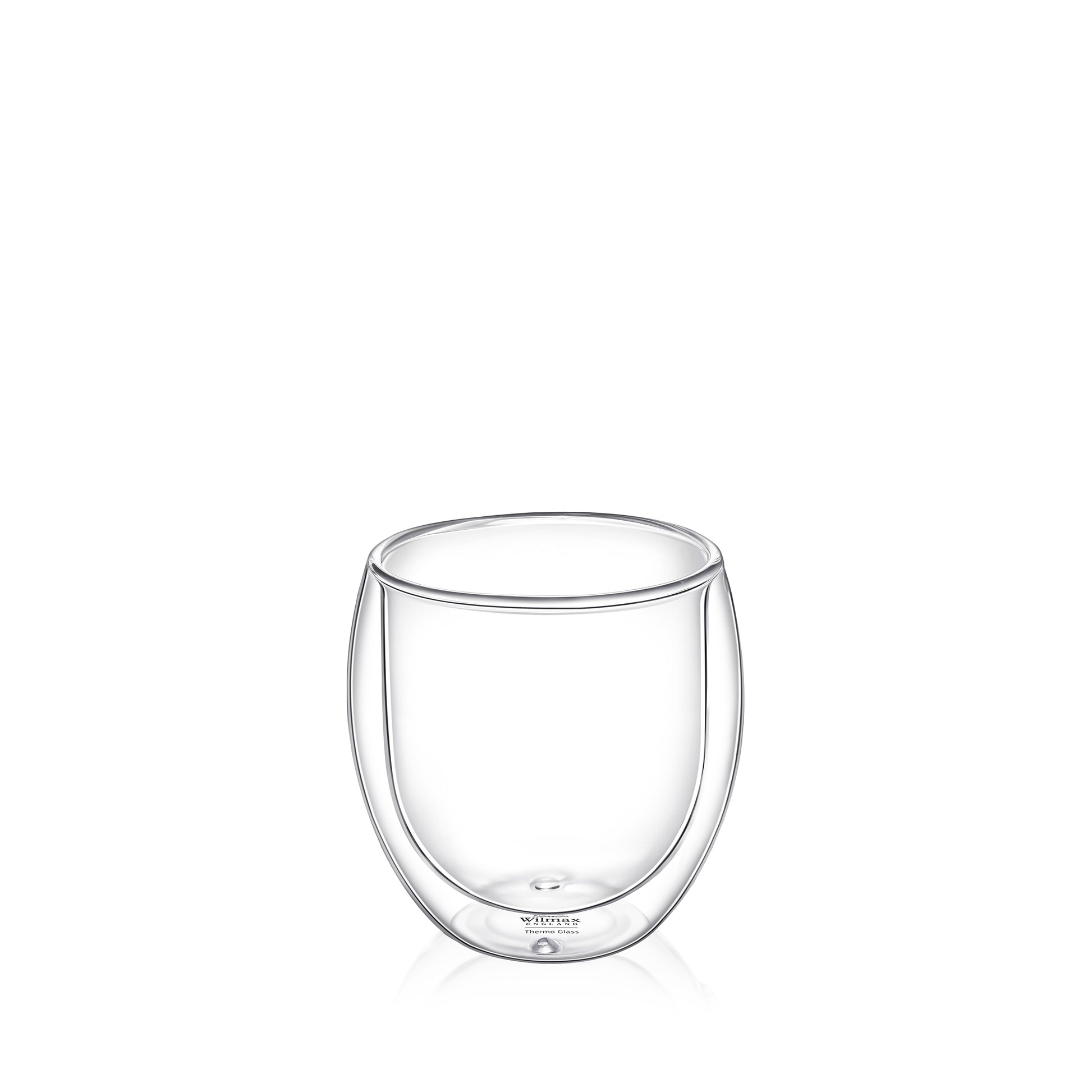 A clear, double-walled Wilmax England Thermo Glass with a 300ml capacity, made from heat-resistant borosilicate glass. The design keeps beverages hot or cold for longer and prevents the outer surface from feeling too hot or cold. The transparent glass allows the contents to be visible. It is shown against a plain white background.