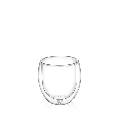 A clear, double-walled Wilmax England Thermo Glass with a 300ml capacity, made from heat-resistant borosilicate glass. The design keeps beverages hot or cold for longer and prevents the outer surface from feeling too hot or cold. The transparent glass allows the contents to be visible. It is shown against a plain white background.